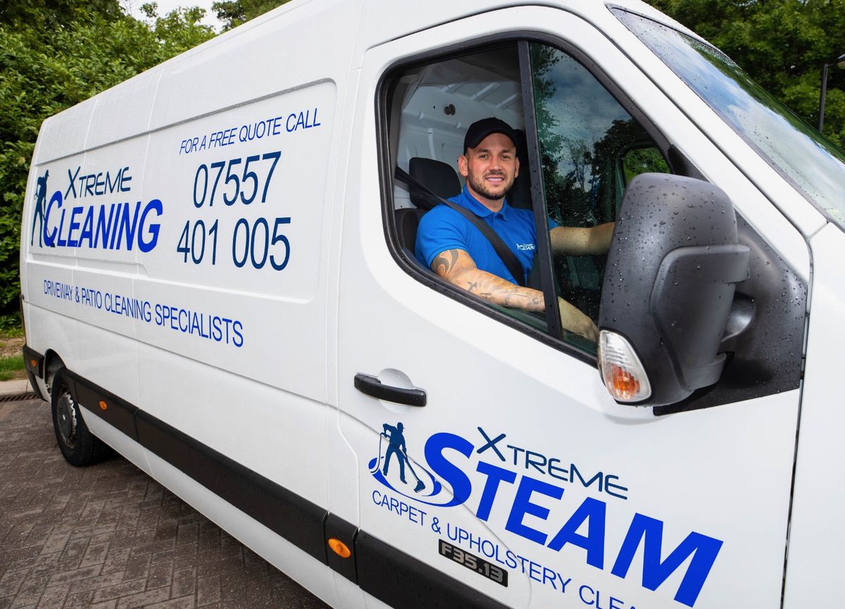 Steven Foxall with the Xtreme Cleaning Services van